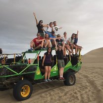 Enjoying the sand dunes in Huacachina, Peru
