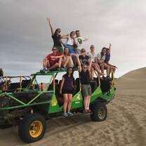 Enjoying the sand dunes in Huacachina, Peru