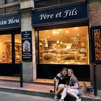 Sitting in front of Le Poussin Bleu