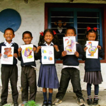 Proud Students pose with their artwork