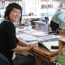 girl smiling at desk 