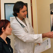 Doctor teaching a medical intern