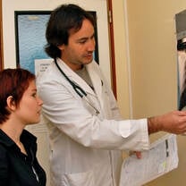 Doctor teaching a medical intern