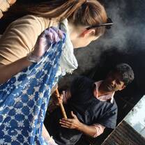 Dying silk textiles at Aranya with natural indigo dye