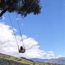 Swing on top of the world in Ecuador
