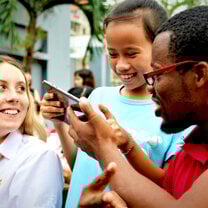 Teachers with student in Vietnam