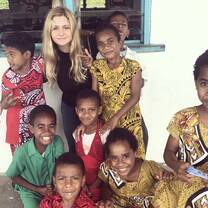 A photo of Alannah and some local Fijian children