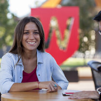 Student and crest Student and crest