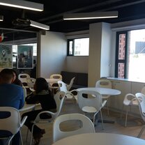room with chairs and tables for students to study