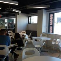 room with chairs and tables for students to study