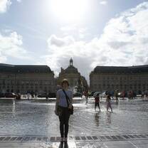 girl in front of fountain