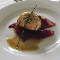 Stuffed baked chicken with pickled red onions