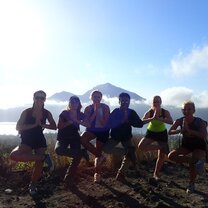 Males students doing yoga and posing in Bali