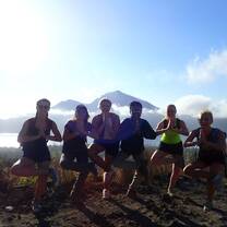 Males students doing yoga and posing in Bali