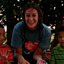 female volunteering with chidlren