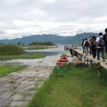 Students hike by water in Guatemala