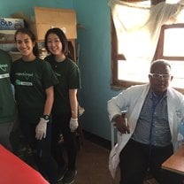 Assisting Dr. Kivuyo in Medical Outreach in Engikaret 