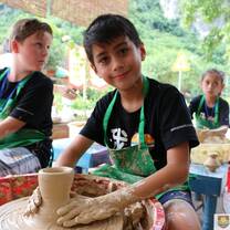 Students in Traditional Pottery class in Yangshuo China