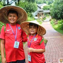Summer Camp students tea leaf picking