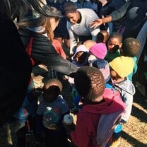 Playing with kids at our service site.
