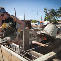 workers pouring cement