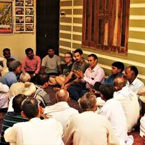 Working with farmers to improve farming methods.