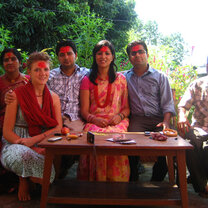 A volunteer celebrating a Hindu festival with her host family