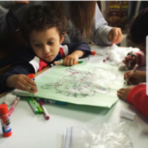 Crafts with Miguel, a student at a supplementary school in La Limonada, Guatemala City