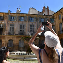 student near fountain in Aix
