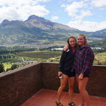 Students standing in front of amazing view of Otavalo