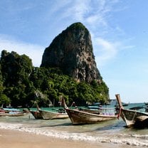 Boats lined up along Railay Beach