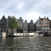 Skinny houses along canal in Amsterdam