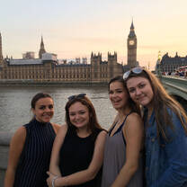 students in front of British parliament buildings and Big Ben