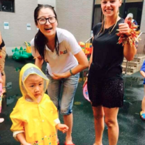 Teachers with student in China