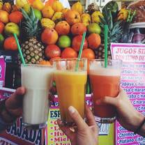 Freshly-squeezed fruit juices made in Mercado San Camilo. 