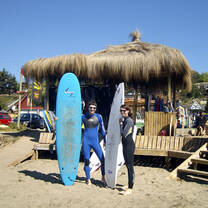 Canadians surf in Chile on a working holiday