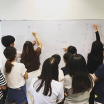 TEFLPros 120 Hour Online TEFL Course  students writing on whiteboard