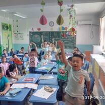 students smiling in classroom in china