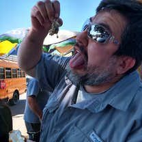 This is JP showing us one way to eat the fruit