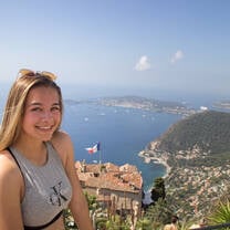 girl above ocean and countryside