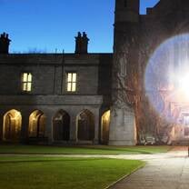 NUI Galway courtyard at night with lamp post