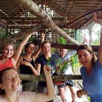 Volunteers group photo renovating a civet enclosure