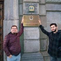 Italian guys in front of his embassy in Spain 
