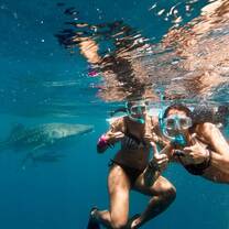 girls underwater snorkeling