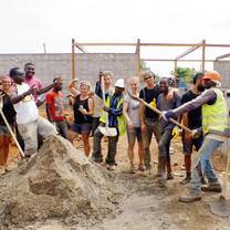 Volunteers on the Rising Education Centre site