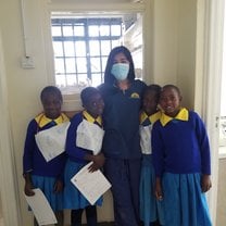 Young girls waiting to receive treatment