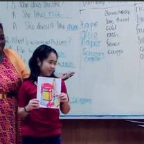 student by the whiteboard