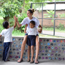 Interacting with local students.