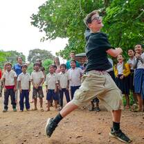 VISIONS participant with Cambodian kids