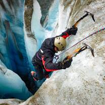 VISIONS Participant ice climbing on the Root Glacier